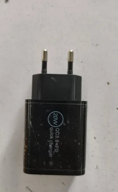 18W USB-C PD fast charger with US plug in black bare metal finish showing USB port