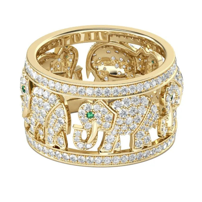 A close-up of a detailed alloy elephant ring with sparkling diamond accents on a gold or silver electroplated band.