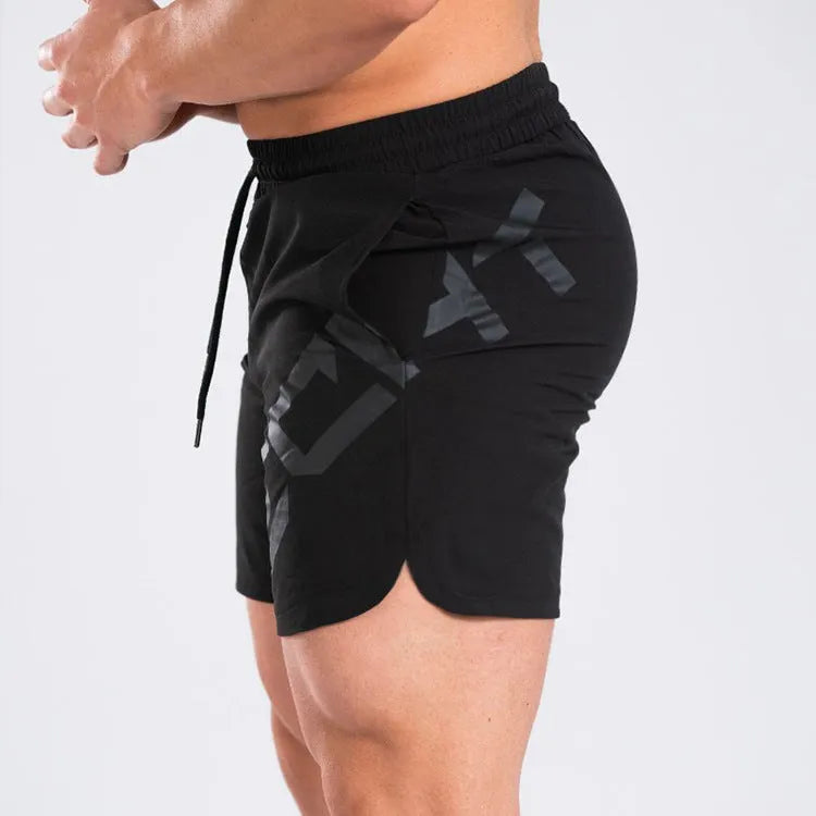 Men's black quick-dry elastic training shorts with knee-length design for summer sports