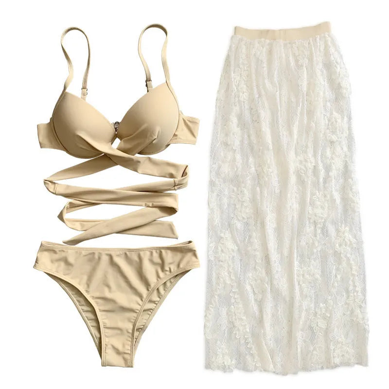 Three-piece push-up bikini set with backless top and matching skirt in polyester fabric
