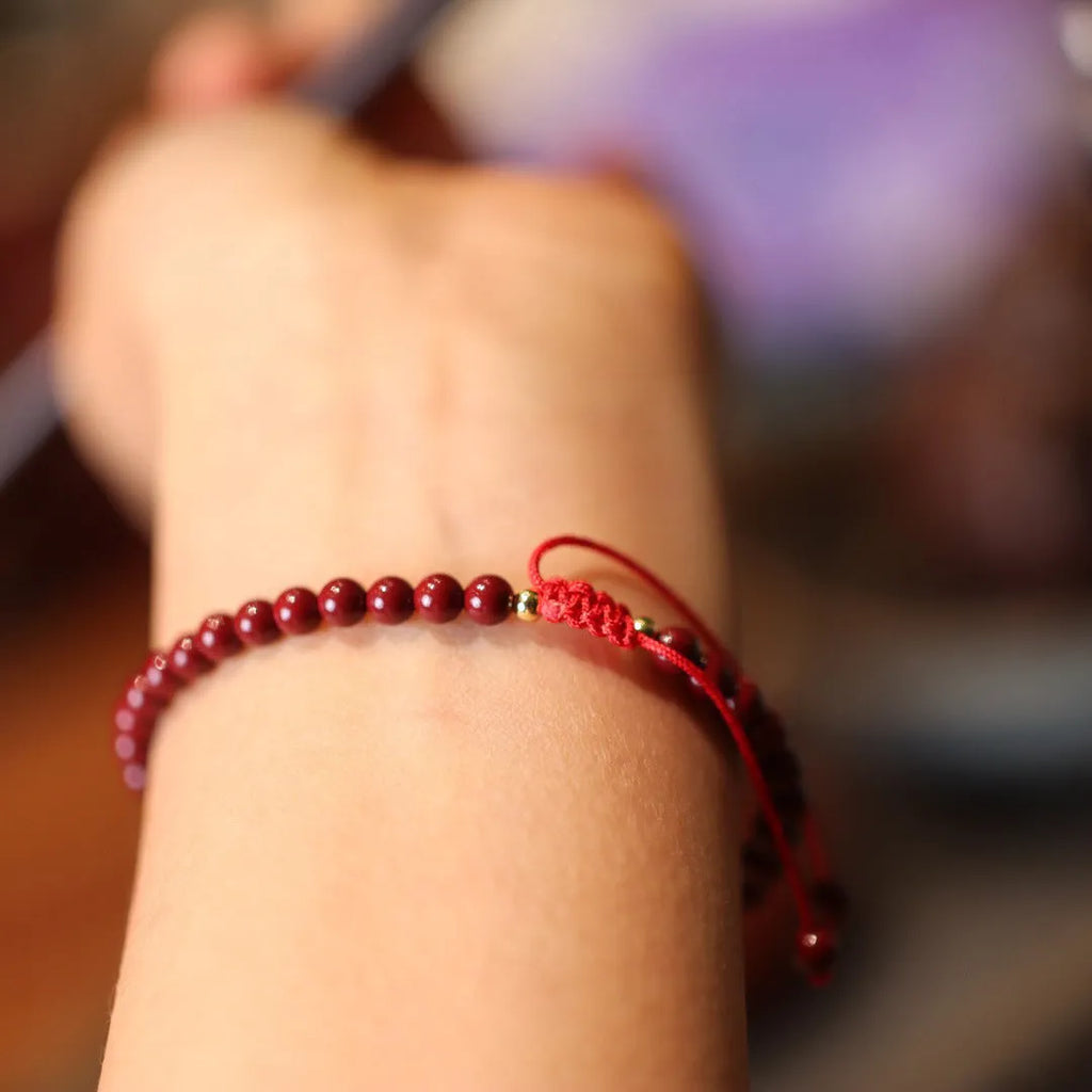 Handmade natural cinnabar bracelet with purple gold sand geometric design, traditional Chinese style jewellery