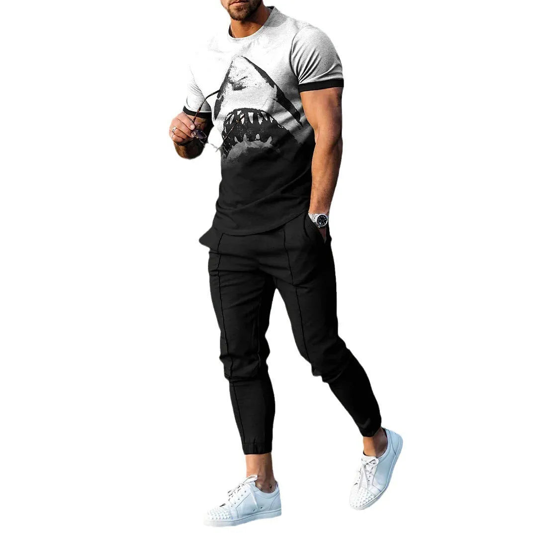 Man wearing a short-sleeved printed round neck pullover and matching trousers from a lightweight athletic suit set.
