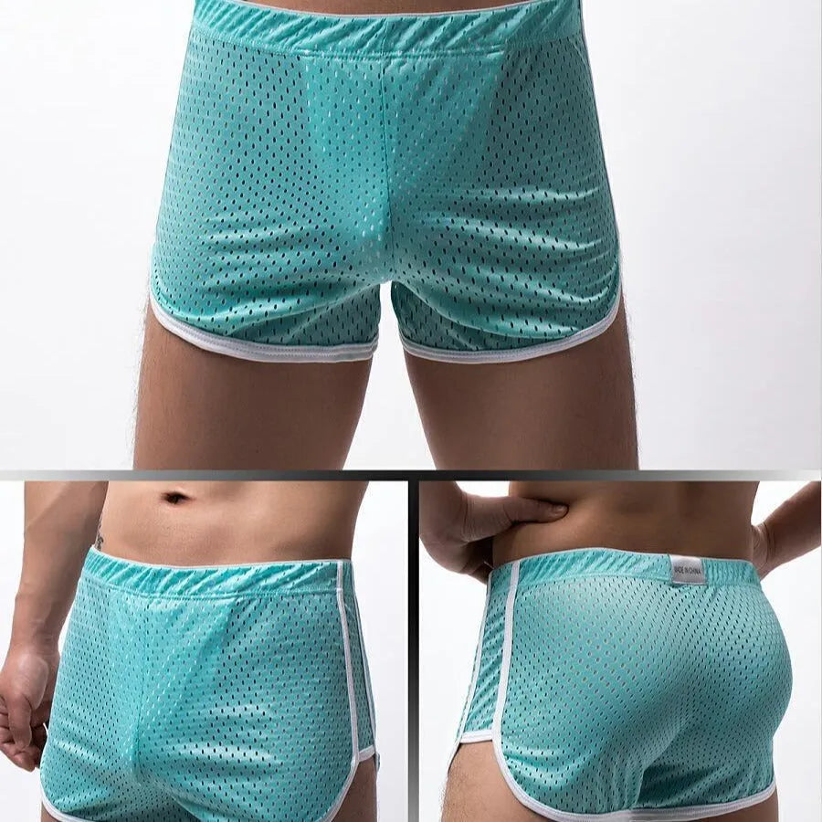 Men's cotton three-point boxer shorts in light blue on a grey background