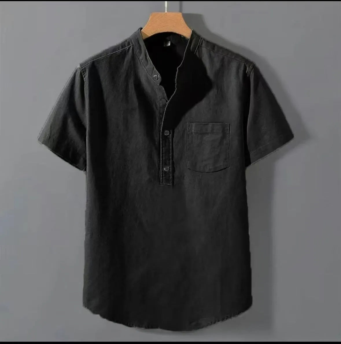 Men's beige casual short sleeve linen shirt with a stand collar and loose fit on a hanger.