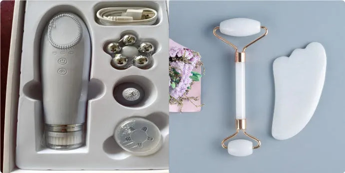 White jade double-headed facial roller and scraping board set on a plain surface.