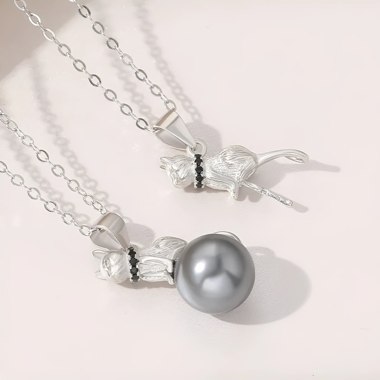 925 sterling silver cat pendant necklace with electroplated finish in clavicle length