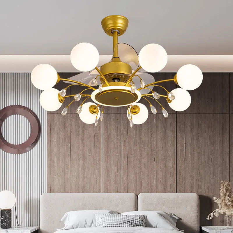 Gold finish ceiling fan chandelier with multiple lights and metal blades, shown installed in a living room.
