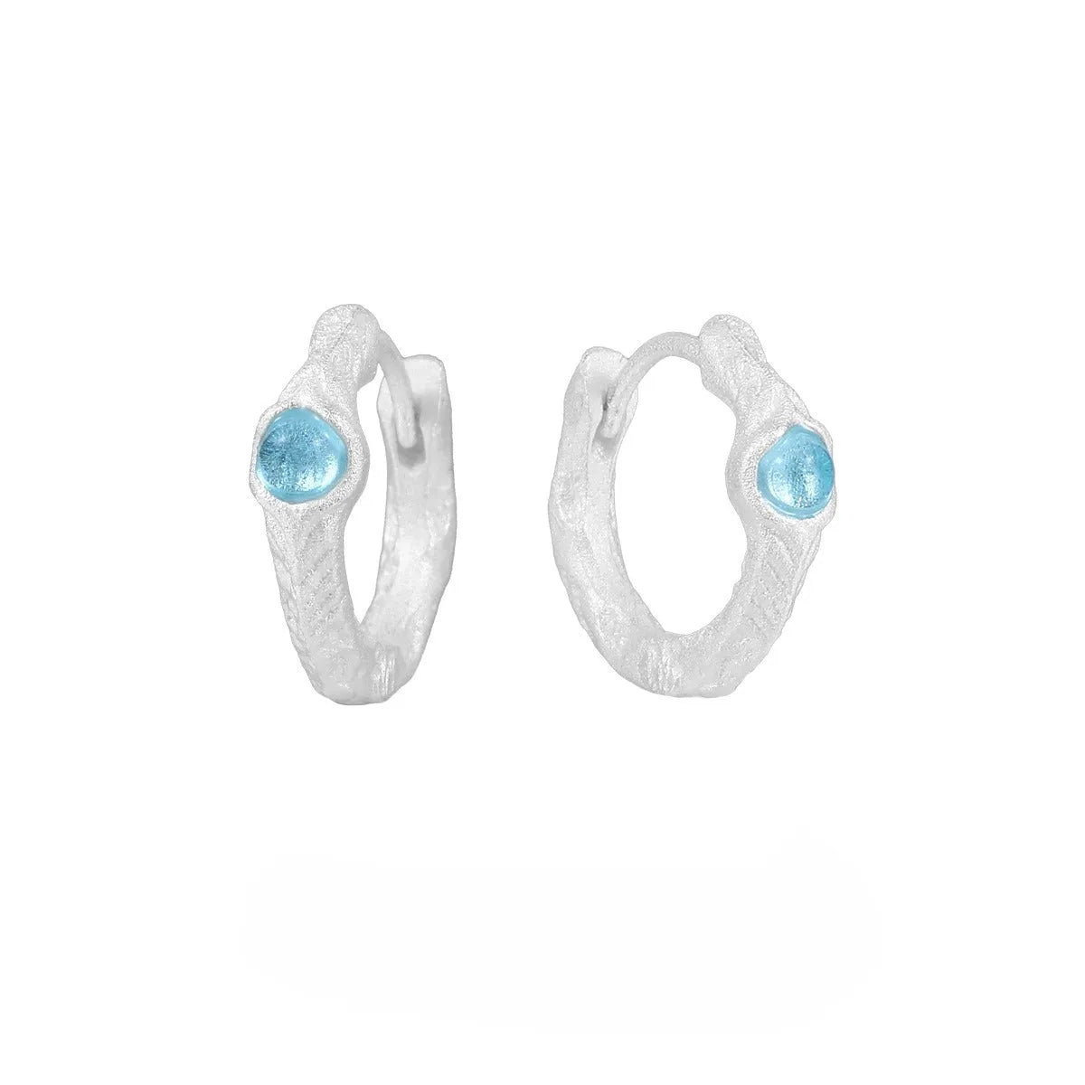 925 sterling silver geometric ear clip with burnt silver electroplated finish and round elements