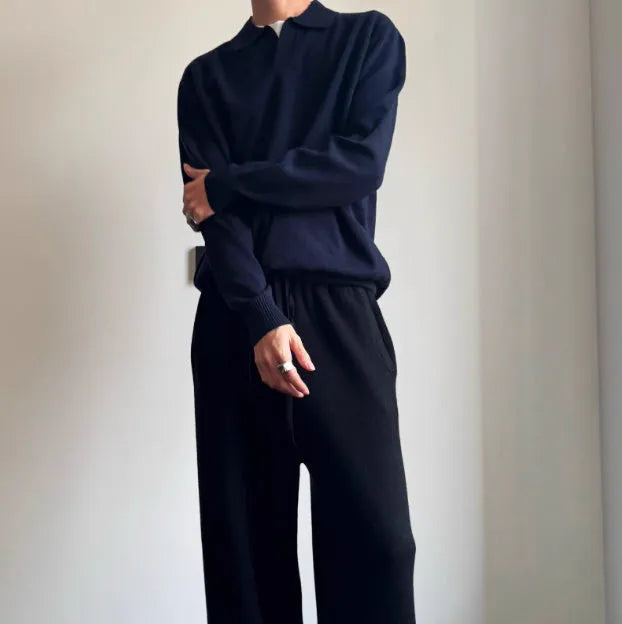 Pure wool polo sweater with lapel collar in loose fit, shown in milky white.