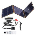 Black foldable 36W portable solar panel unfolded showing three solar cells, with car charger and cables.