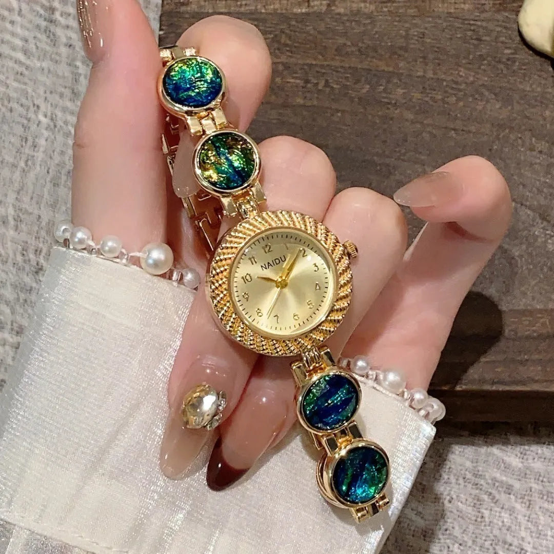 Women's quartz watch with 25mm round dial and zinc alloy case in a choice of six colours.