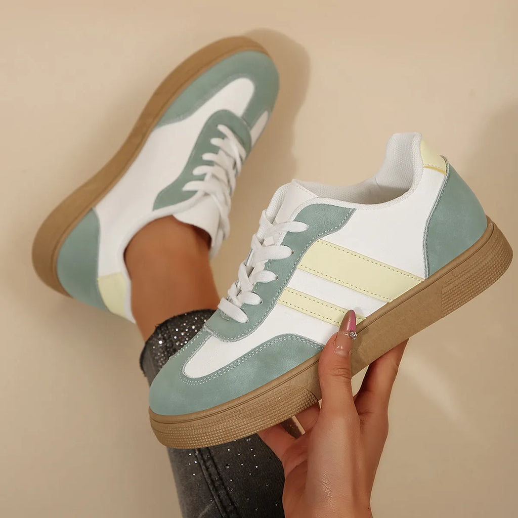 Green retro sports women's shoes with cross-strap design and low-top construction