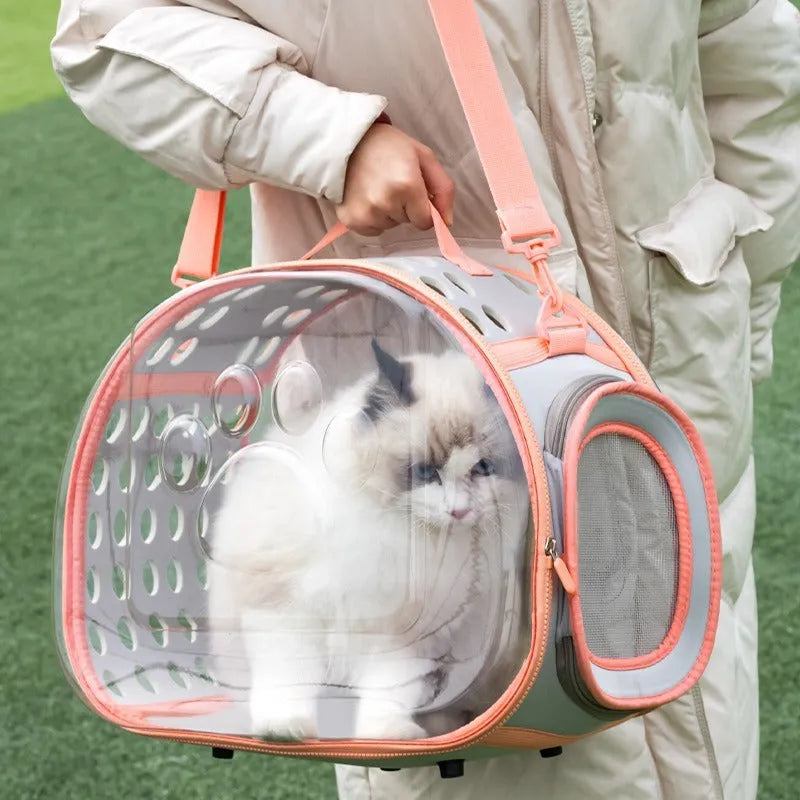 Transparent space capsule cat backpack carrier in grass green colour showing hard EVA construction and dimensions for cats up to 9kg