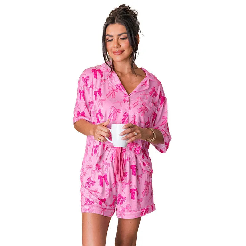 Pink bow print two-piece polyester pyjama set with lightweight fabric for sleep and homewear