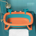 Blue foldable portable pet tub for small dogs and cats under 20 pounds.