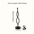 Black aluminium desk lamp with a touch dimming button for blue, pink, and warm white light.
