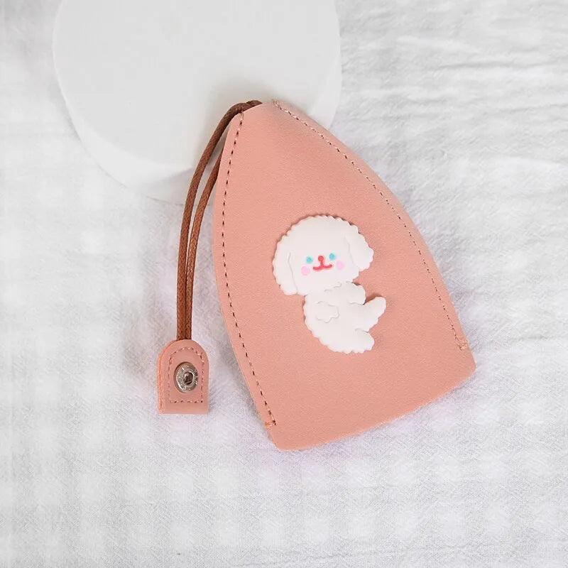 Cartoon pull-out key case in PU leather showing design options including resin fruit and big cartoon animal prints.
