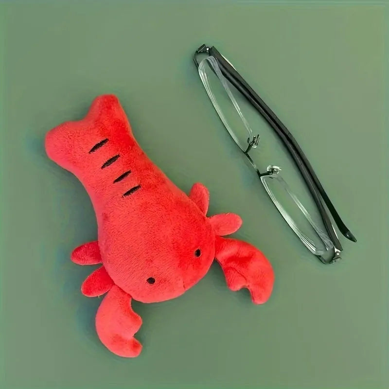 Red lobster stuffed squeaky dog toy for small medium breeds on white background