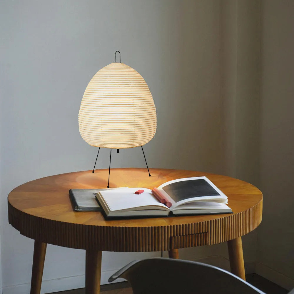 Handmade Nordic-style table lamp with a Japanese rice paper shade and aluminium base on a wooden table