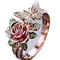 Adjustable butterfly personality ring with colourful oil drip finish showing rose and leaf design elements