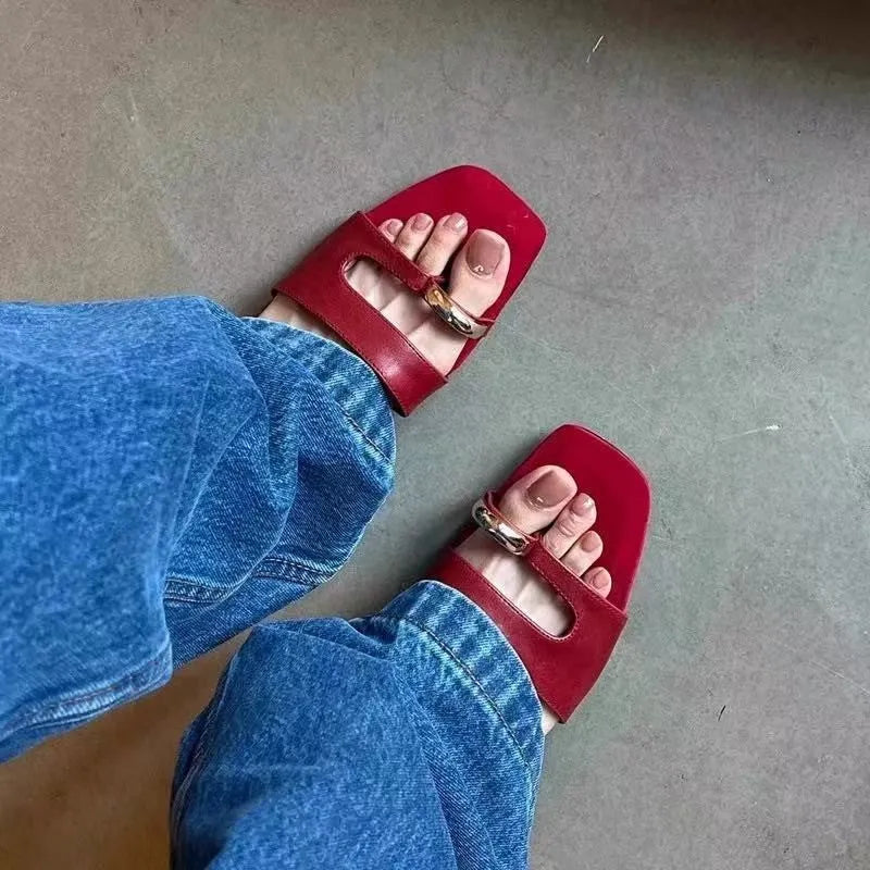 Women's plus size square toe outdoor slippers in leather with a rubber sole.