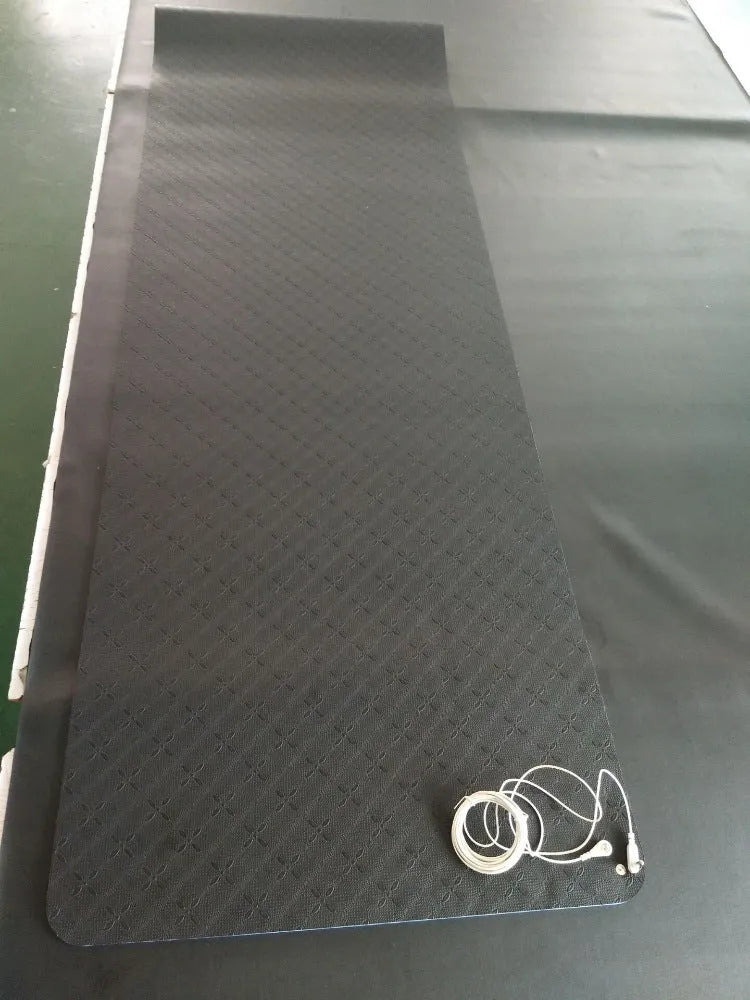 Blue conductive yoga mat with floral pattern, grounding wire, and non-slip PU leather surface