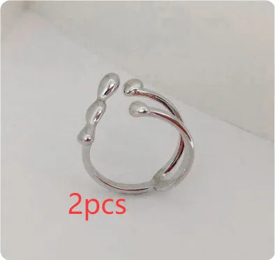 Adjustable brass opening ring with sphere design in gold colour for women