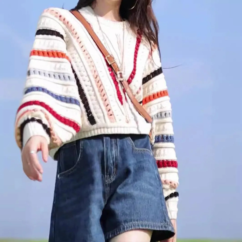 Rainbow striped hollow pattern sweater with batwing sleeves in loose fitting casual style