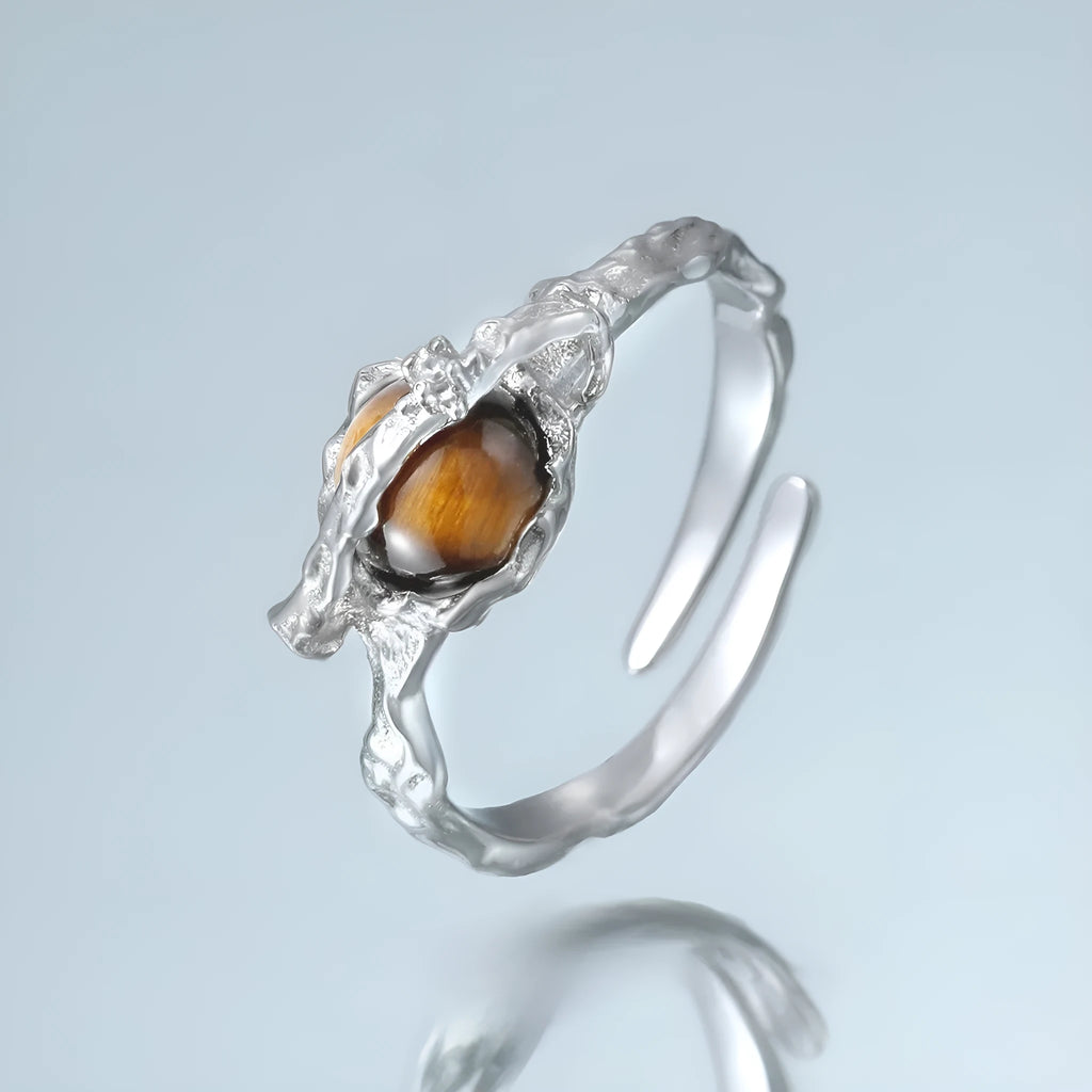 Adjustable opening Saturn ring in white gold colour electroplated silver with tigereye design