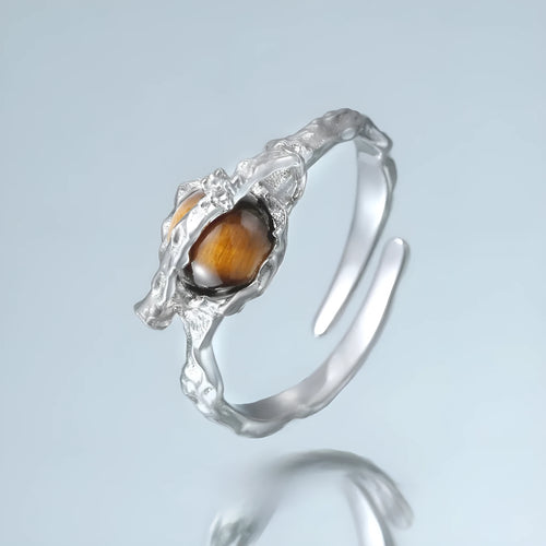 Adjustable opening Saturn ring in white gold colour electroplated silver with tigereye design