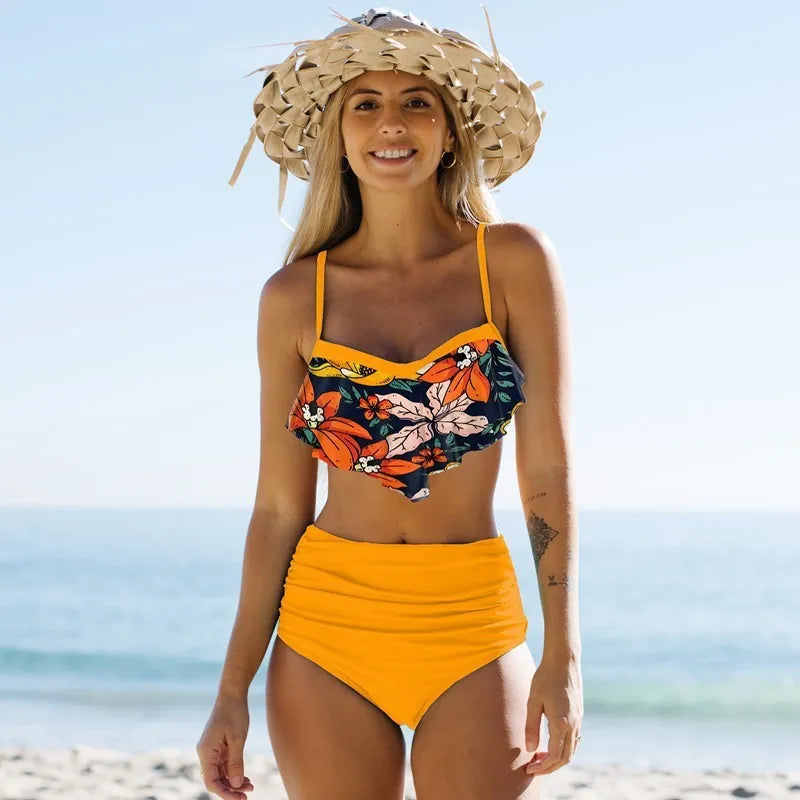 Green high-waisted pleated pants bikini swimsuit for women on a mannequin.