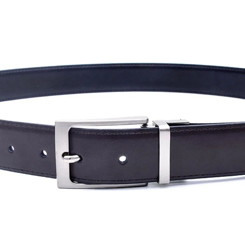 Men's dark brown genuine leather belt with a silver rotating pin buckle laid flat.