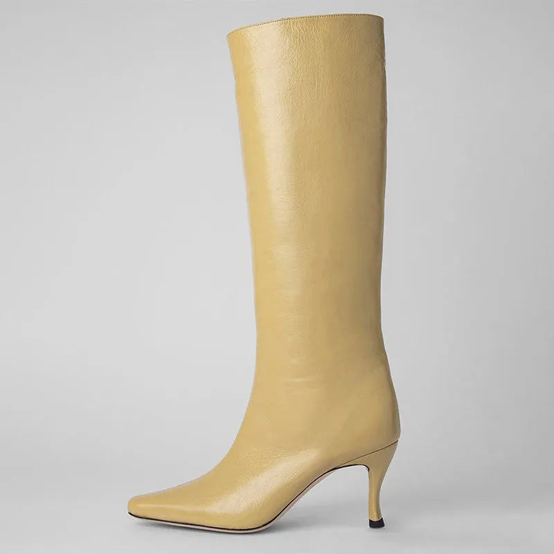 Women's square toe cowboy boot in a selection of colours including black, snake pattern, and brown stone.
