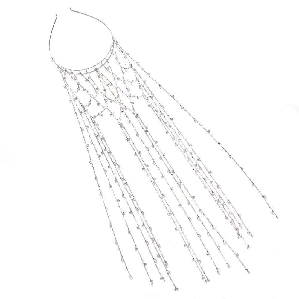 Gold metallic mesh headband with rhinestones and a dangling tassel decoration.