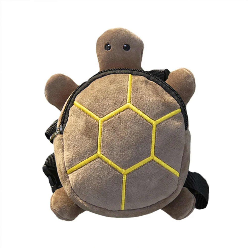 Brown turtle-shaped dog backpack harness with metal zipper and storage compartment