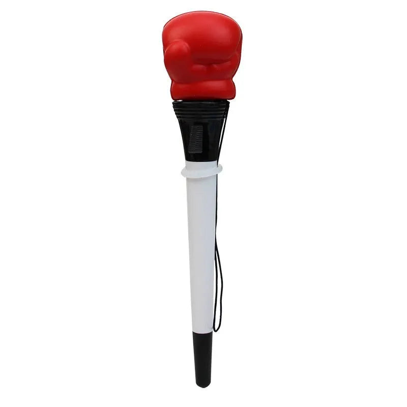 Set of four black ejection pens with a pressure relief boxing press button on the barrel.