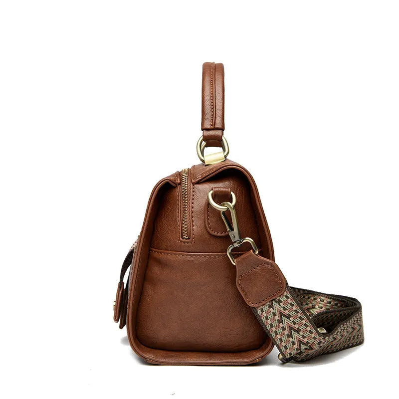 Soft grey PU women's crossbody bag with a square shape and an external sandwich pocket.