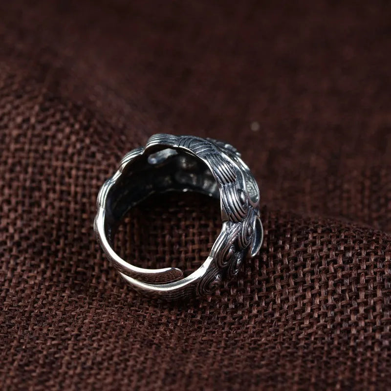 Silver open ring with detailed Jibeast animal pattern and retro styling