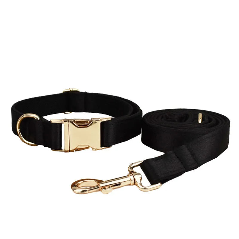 Cloth dog collar and leash set with matching decorative bow and dog vest on a size chart showing S, M, L, XL.