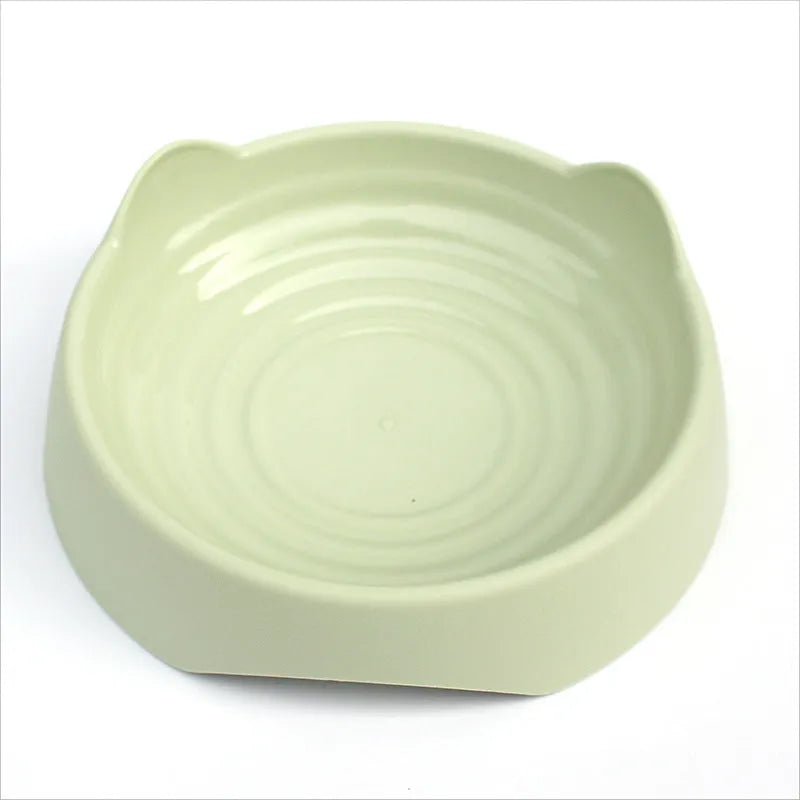 Blue ceramic dog slow feeder bowl with raised maze pattern inside for slowing down fast eaters.