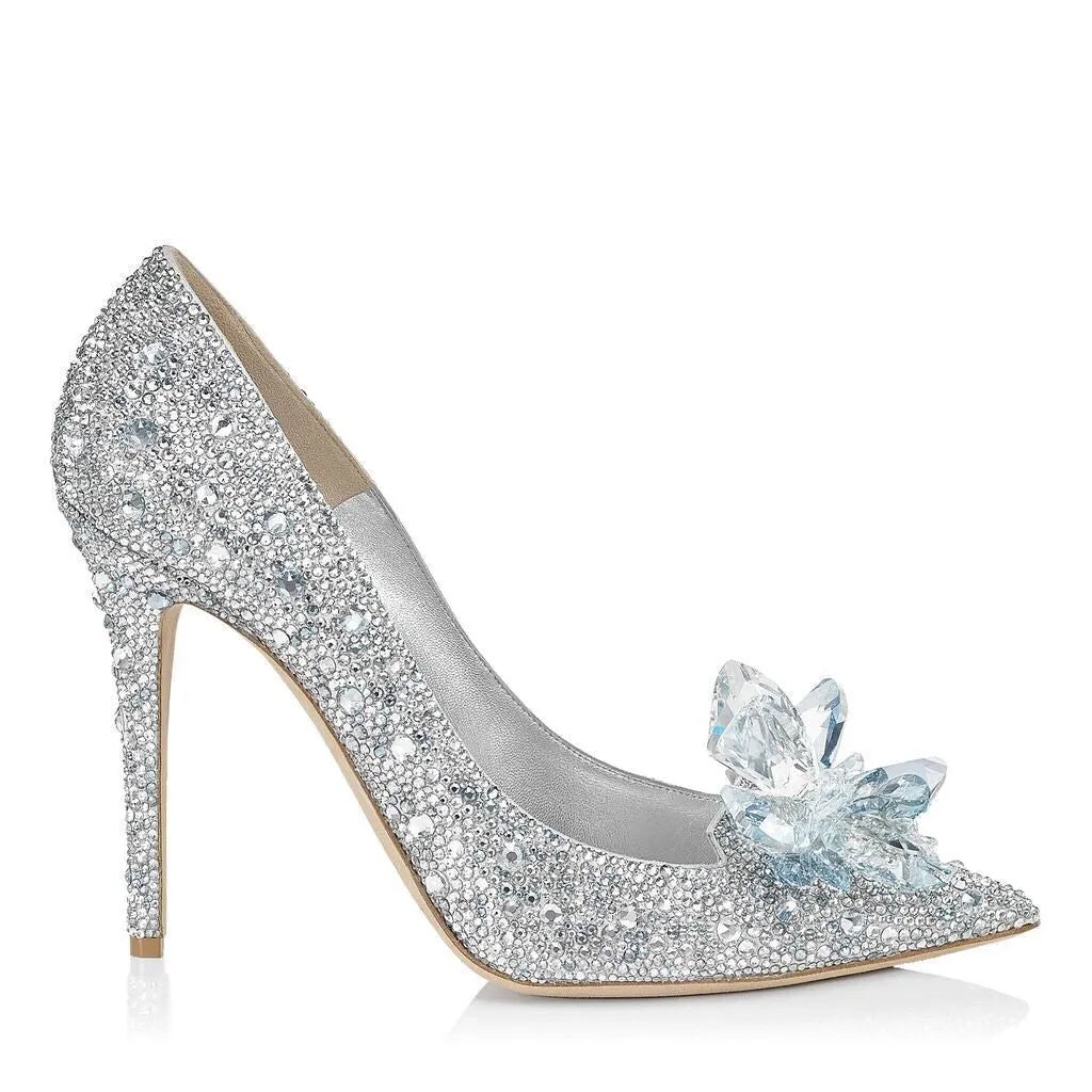 Women's gold pointed toe high heels with rhinestone detail and stiletto heel