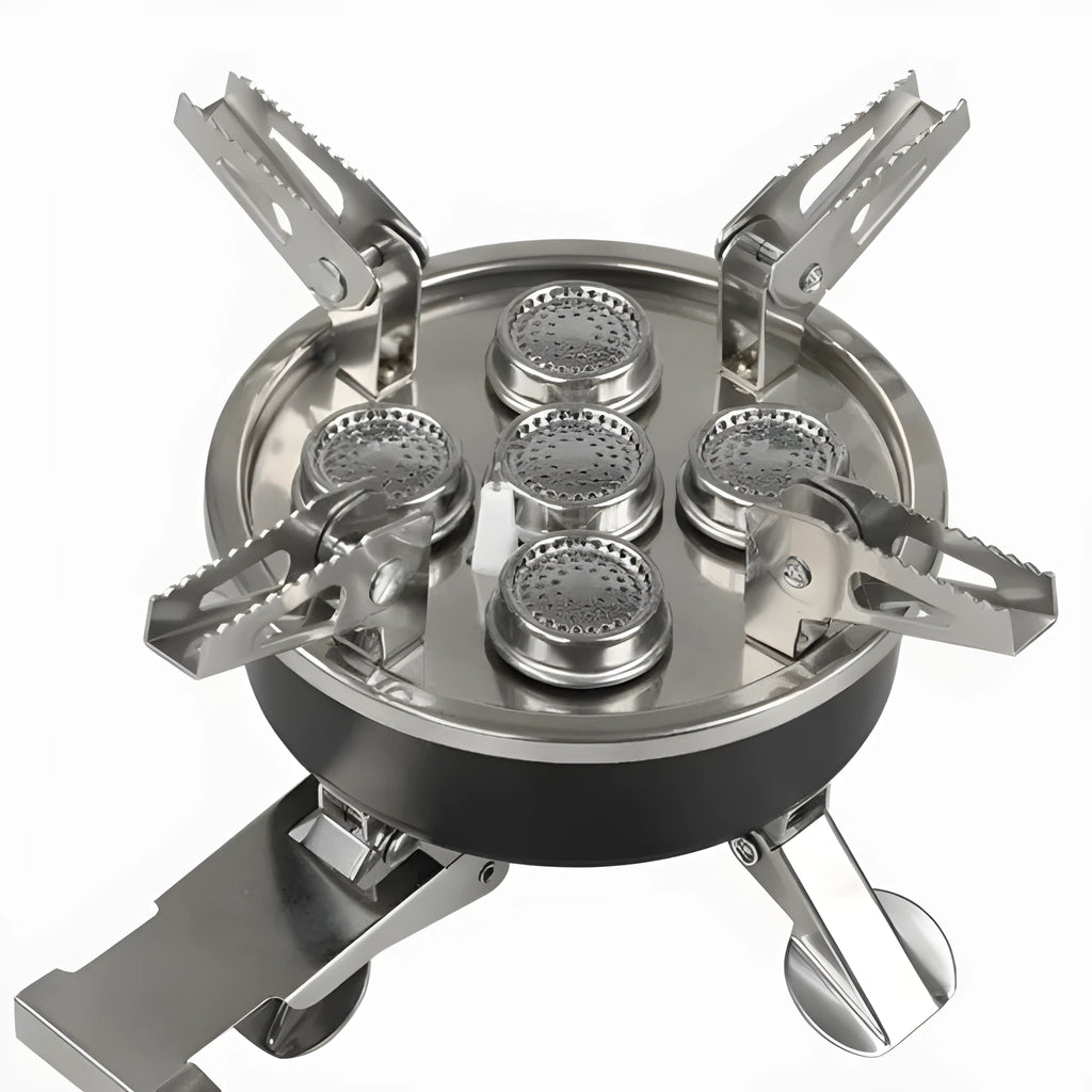 Silver coloured portable split stove made of stainless steel and copper with a long hose, shown folded for transport.