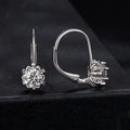 Sterling silver flower bud ear clip with white gold plating and 0.5 carat moissanite stone