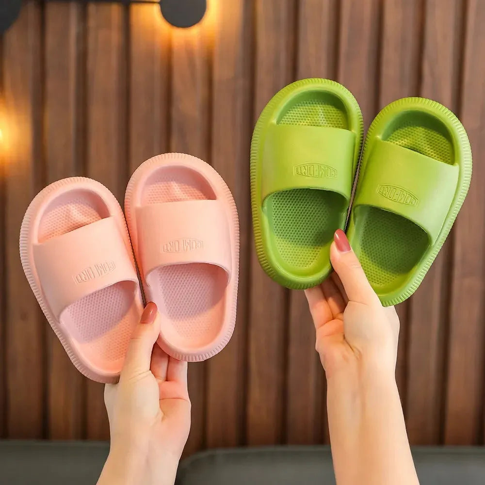 Children's EVA slippers with non-slip soles in mixed colour options showing size range