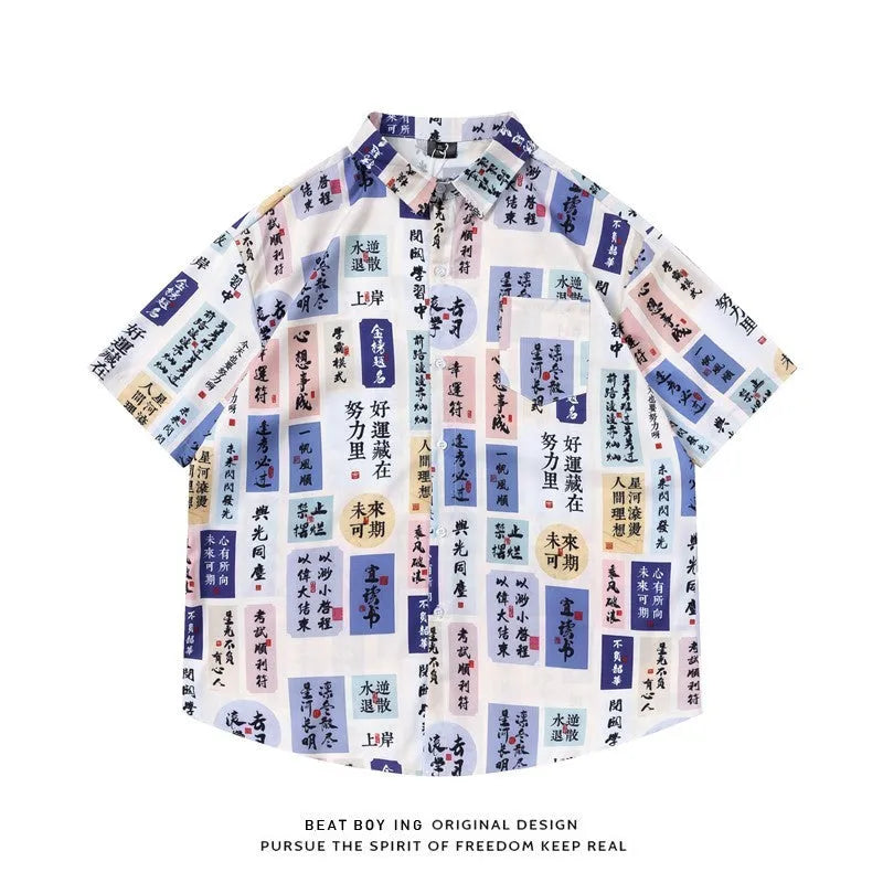 Loose fit short sleeve shirt with all-over floral print, cardigan style, in a polyester fabric.