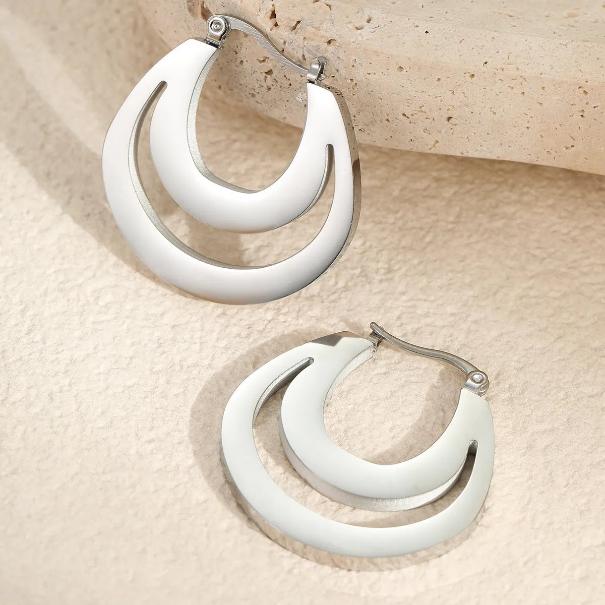 Geometric minimalist French earrings with 18K gold plating and round ring elements