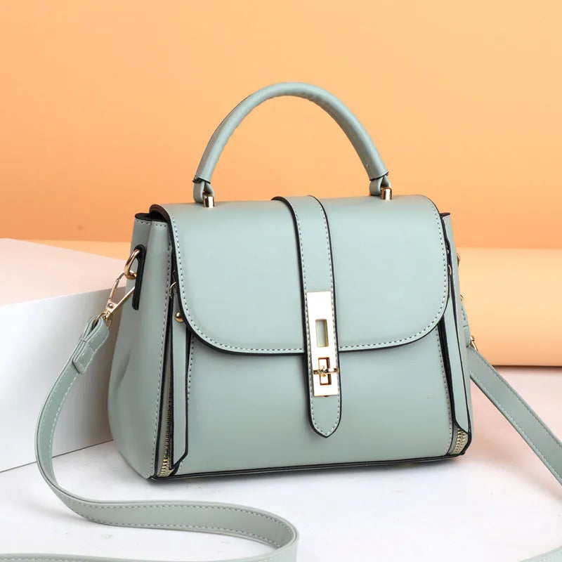 Soft PU leather women's messenger bag in a square vertical shape with an adjustable shoulder strap.