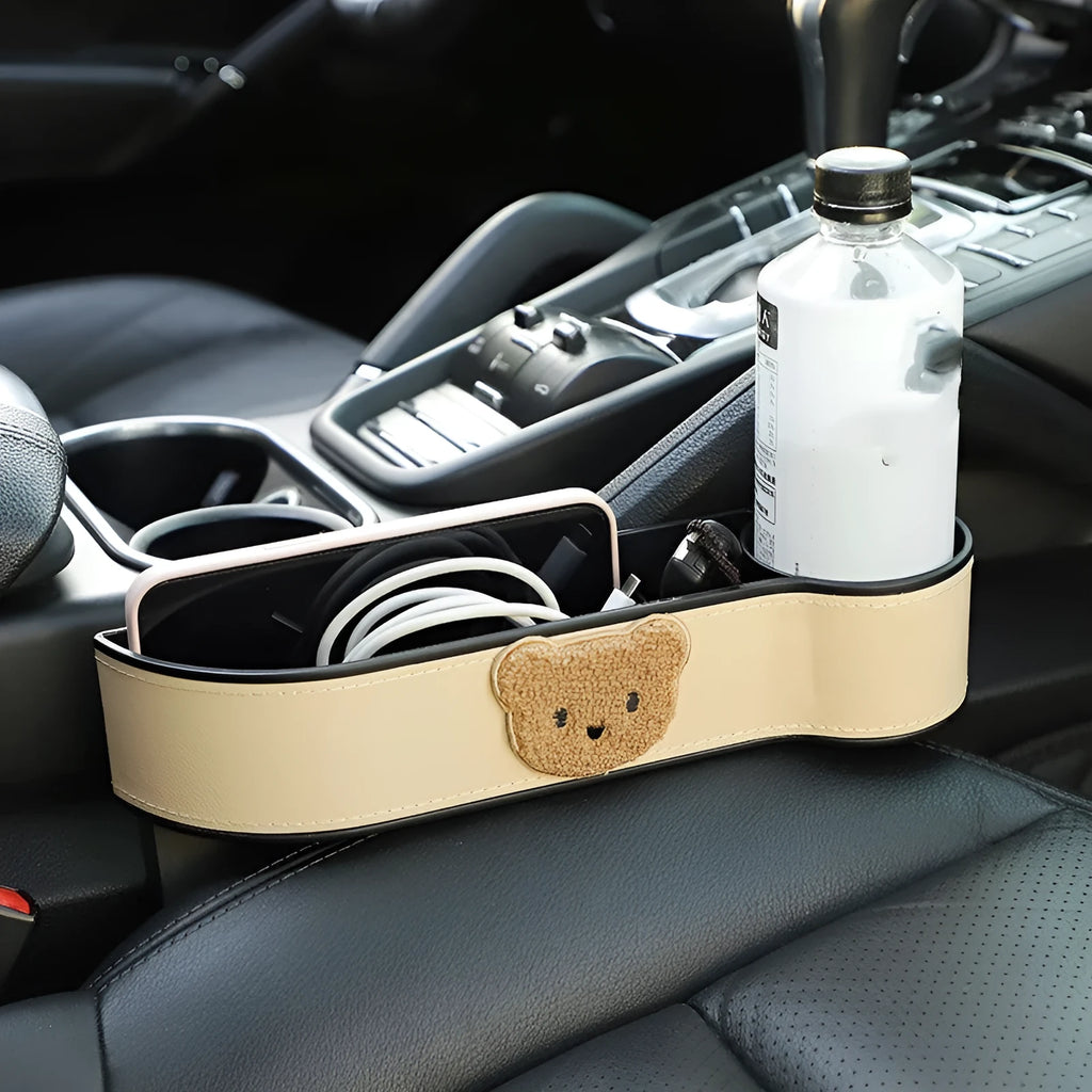 Leather car seat gap storage box with cartoon bear design hanging between vehicle front seats