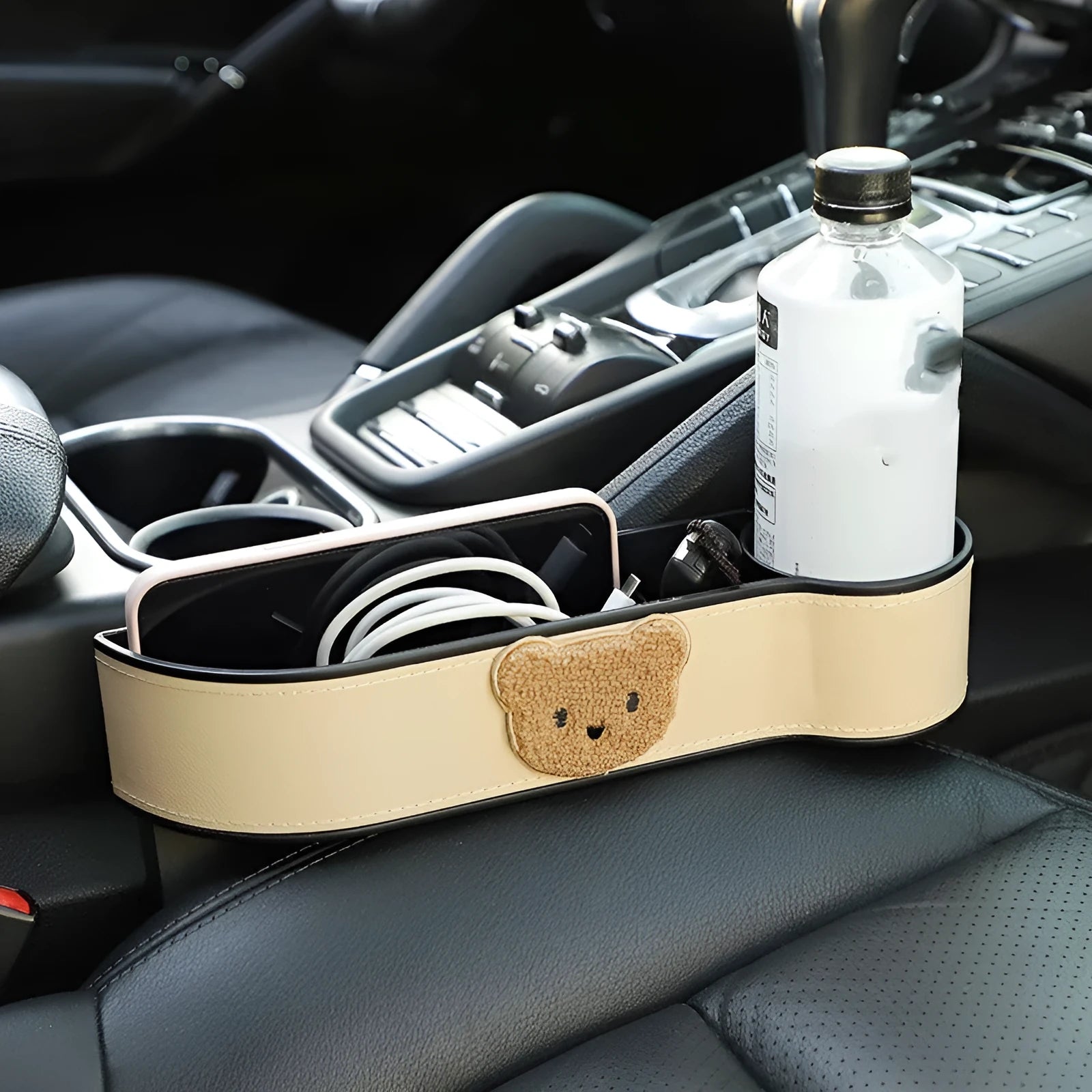 Leather car seat gap storage box with cartoon bear design hanging between vehicle front seats