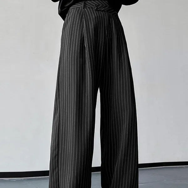 Men's black vertical striped pleated casual trousers showing front view